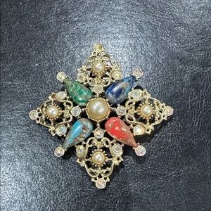 Elegant Multicolor Brooch with Gold Accents